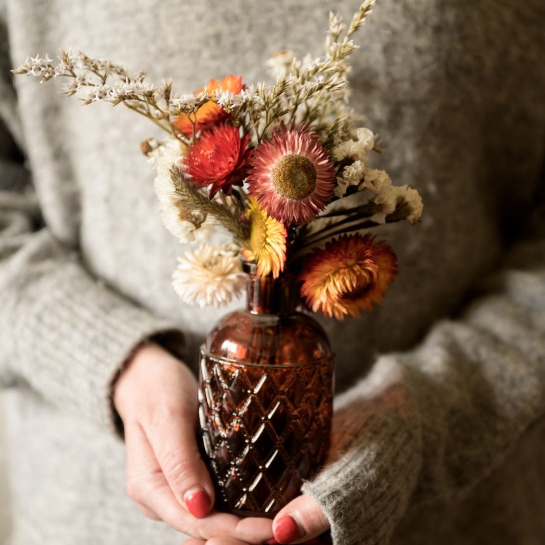 Bud vase with flowers